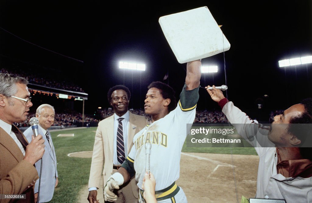 Rickey Henderson Holding up Base