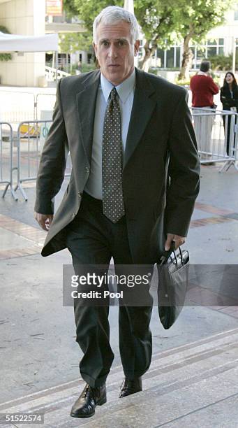 Attorney Michael Cardoza walks into Superior Courts for the Scott Peterson murder trial October 20, 2004 in Redwood City, California. Cardoza, who...