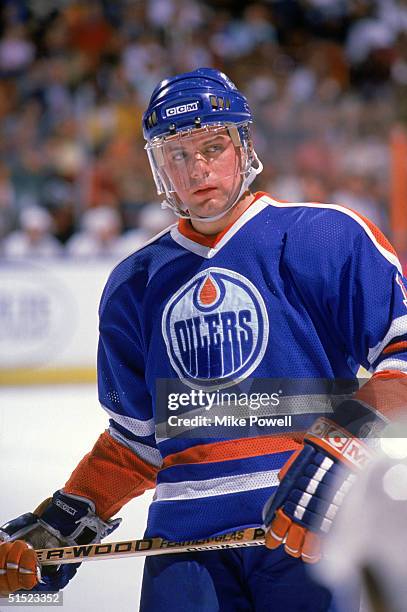 Jimmy Carson of the Edmonton Oilers looks on during a game against the Los Angeles Kings in 1988 at the Great Western Forum in Inglewood, California.