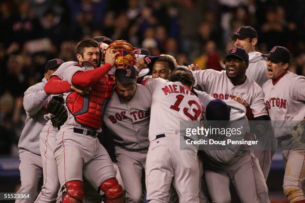 The Boston Red Sox celebrate after defeating the New York Yankees 10-3 in game seven of the American League Championship Series on October 20, 2004...