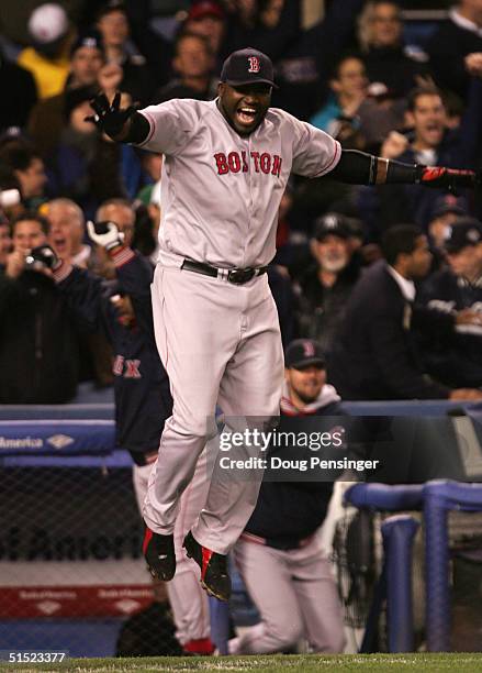 David Ortiz of the Boston Red Sox celebrates after defeating the New York Yankees 10-3 in game seven of the American League Championship Series on...