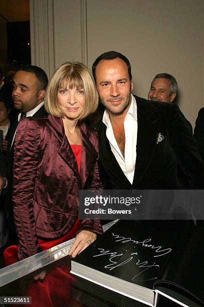 Fashion designer Tom Ford and American Vogue Editor Anna Wintour pose at the book launch party for 'Tom Ford:Ten Years' at Bergdorf Goodman October...