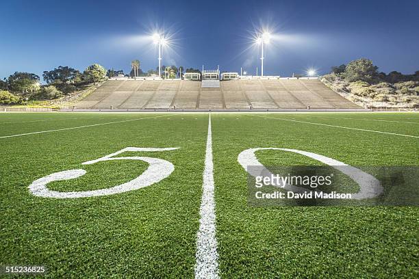 fifty-yard line, football field - american football pitch fotografías e imágenes de stock