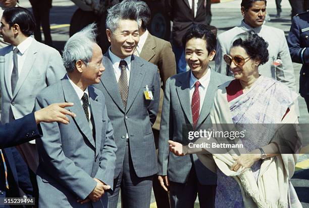 New Delhi, India: Indira Gandhi, Prime Minister of India, welcomes the North Vietnamese representative Pham Van Dong, to the Non-Aligned Nations...