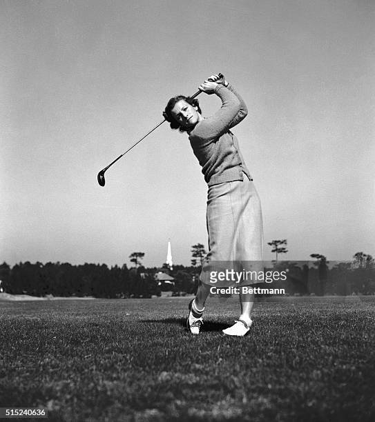 Miss. Mildred "Babe" Didrikson is practising on Pinehurst's golf links for the exhibition match in New York on November 14, in which she will play...