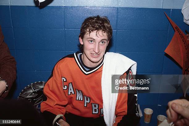 Wayne Gretzky, #99 of the Edmonton Oilers, is shown smiling in the locker room after his fabulous four-goal performance in the NHL All-Star game at...