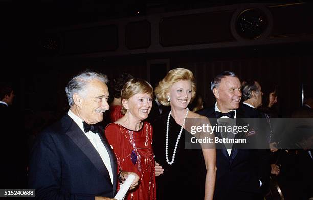 Victor Borge and his wife, Sauna, along with Frank Sinatra and his wife, Barbara Marx, at Manhattan's Radio City Music Hall for a benefit for the...