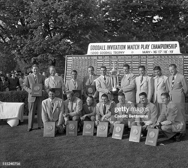 Money winners in the $5,000 Goodall Round Robin Golf Tourney at Flushing, New York, holding their trophies after completion of the final round, May...