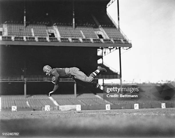 Red Grange Jumping in Air