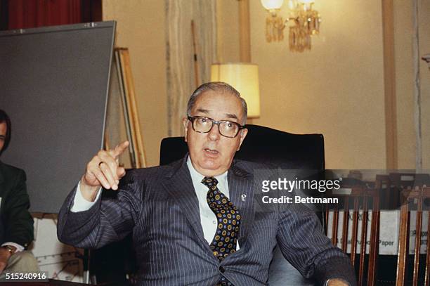 Washington, DC: Close-up of United States Senator Jesse Helms , seated at his desk in Washington.
