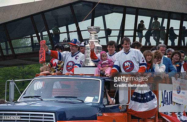Uniondale, New York: The Stanley Cup winning New York Islanders ride in the back of a truck in Uniondale, new York. In the truck are Denis Potvin,...