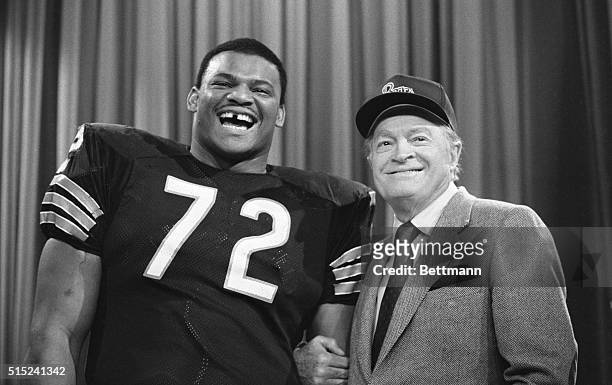 Chicago: Bob Hope and Chicago Bears' William "The Refrigerator" Perry share a laugh together during break in video-taping for the Bob Hope Christmas...