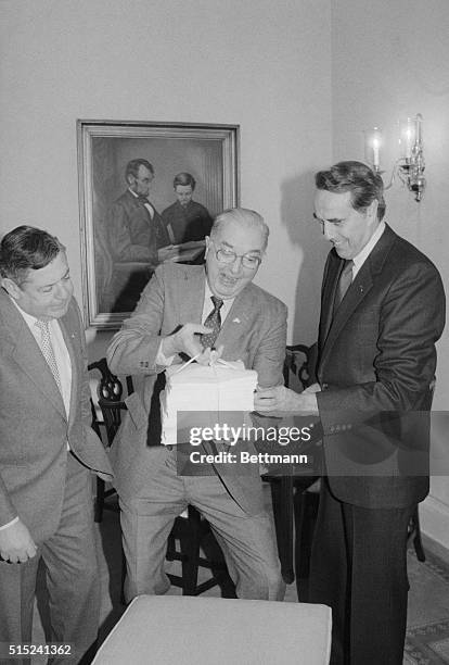 Washington: As Senate Majority Leader Robert Dole watches, Sen. Jesse Helms, R-N.C., chairman of the Senate Agriculture Committee, samples the...