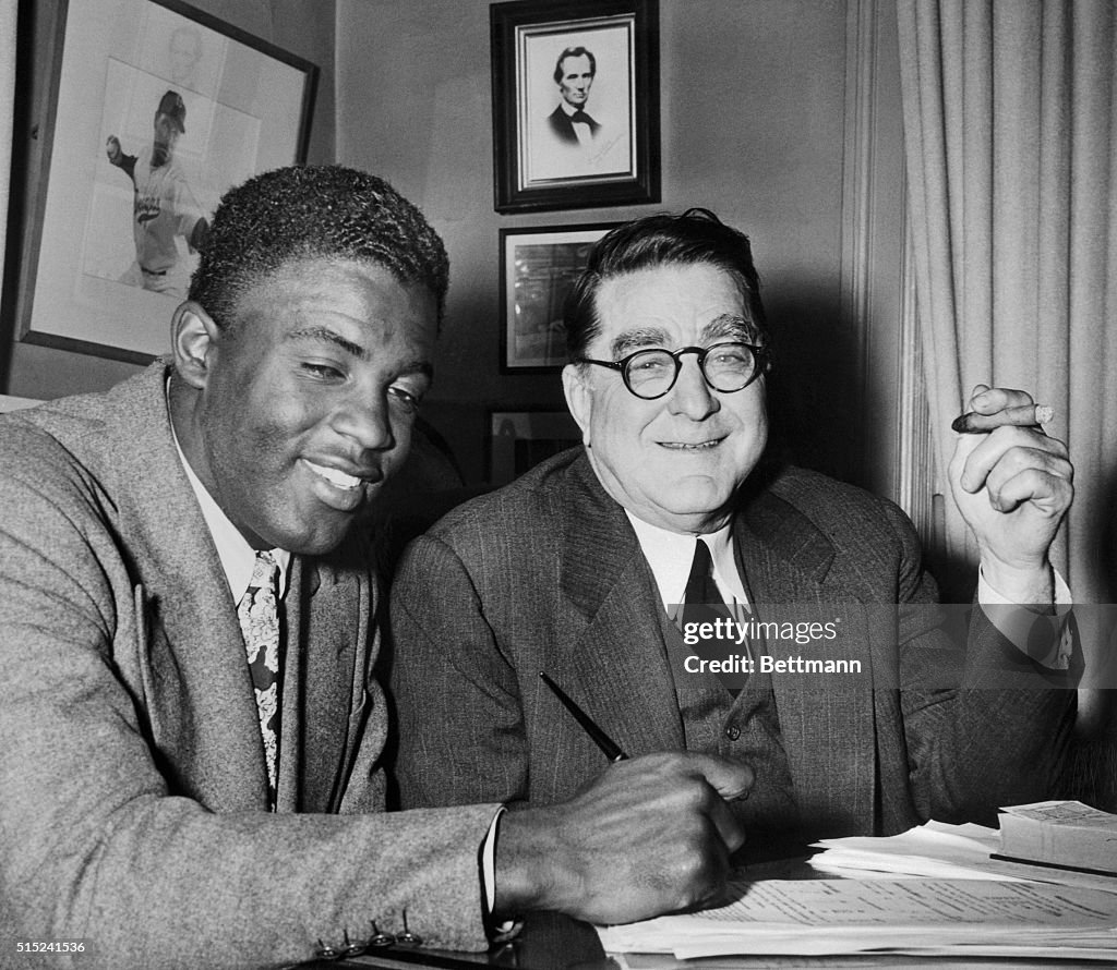 Jackie Robinson Signing Baseball Contract