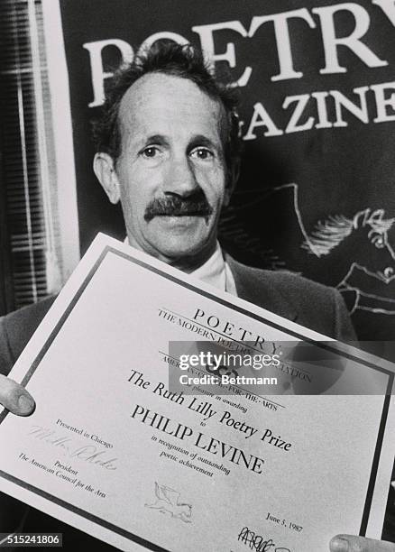 Chicago: Philip Levine, a poet and English Professor at Tufts University, holds award 6/5, after receiving the $25,000 Ruth Lilly Poetry Prize by the...