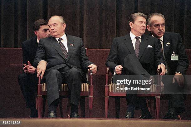 At the closing ceremony for the Geneva Summit, Soviet leader Mikhail Gorbachev and US President Ronald Reagan face away from each other, 21st...
