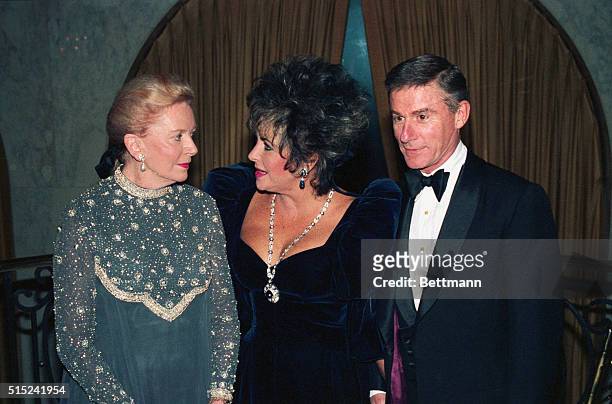 Hollywood, California: , Deborah Kerr, Elizabeth Taylor and Roddy McDowall prior to the ceremony in which Kerr and McDowall were presented with...