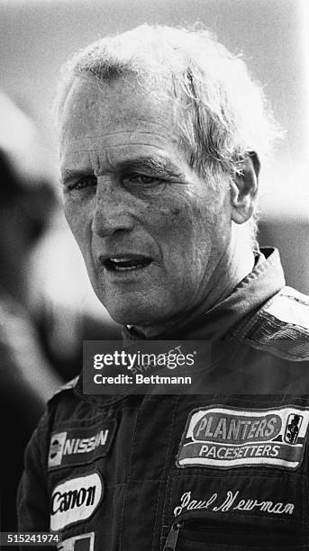 St. Petersburg, FL- Paul Newman prepares to take the wheel of car during St Petersburg Grand Prix. Newman's teammate Jim Fitzgerald perished in the...