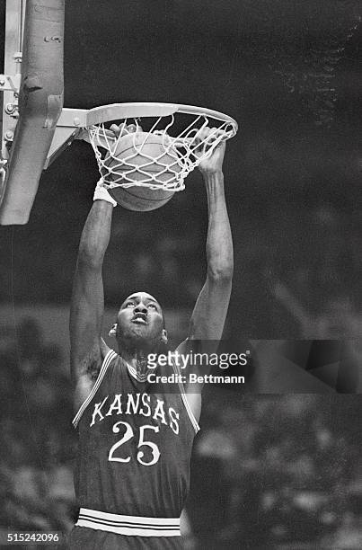 Danny Manning of the University of Kansas makes 2 of his team-high 25 points during the first half action against St. John's University at Madison...