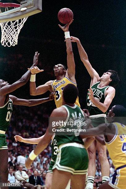 Inglewood, CA- Lakers', Kareem Abdul-Jabbar, tries for a basket against the Boston Celtics.
