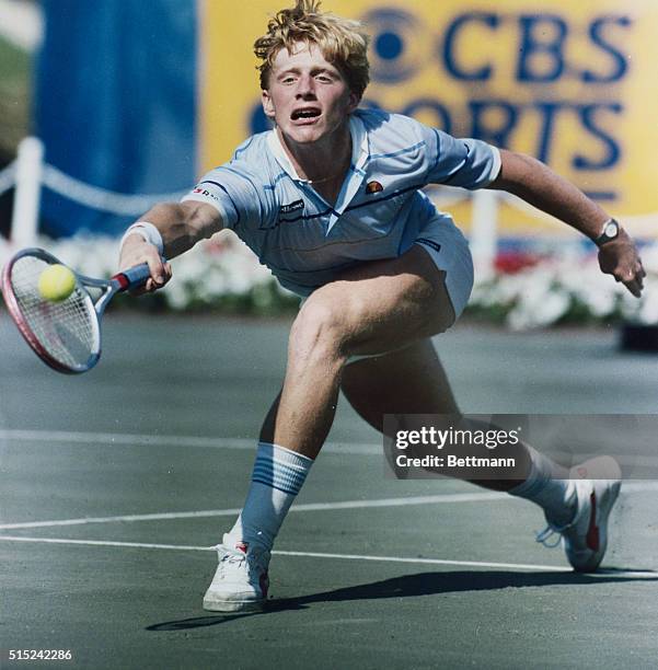 Indianapolis: U. S. Clay Courts. Boris Becker of West Germany reaches out to hit forehand return near the net to Ivan Lendl of Czechoslovakia 7/27...