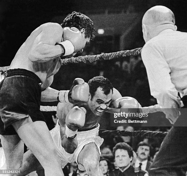 February 9, 1986-Reno, California: Former triple title holder Alexis Arguello pounds former WBC super lightweight champion Billy Costello with a left...