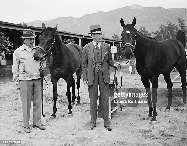 Los Angeles, California: Howard Hopefuls For Santa Anita 'Cap. C. S. Howard is shown here with two of the brightest stars of his stable as nominees...