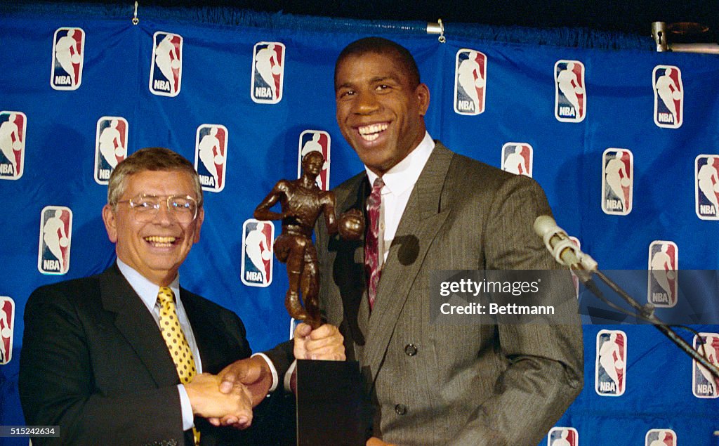 Magic Johnson and David Stern Shaking Hands