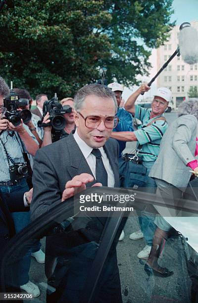 Charlotte, N.C.: Jim Bakker comments to newsmen as he leaves Federal Court in Charlotte. Bakker stated that he was, "looking toward the weekend" as...