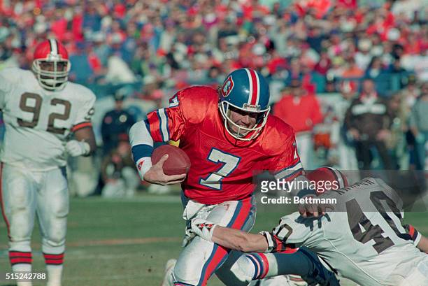 Denver: Clevelands' Kyle Kramer brings down the Bronco's John Elway but not Elway picked up 11 yards to the Cleveland 22 yard line, setting up a 4th...