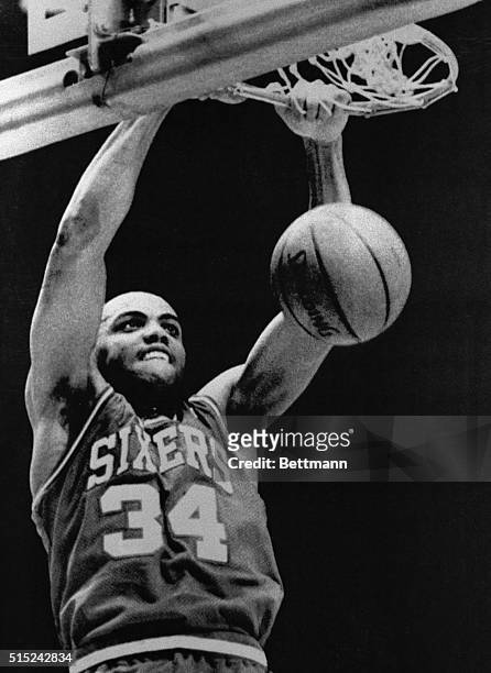 Landover, Md.: Philadelphia's Charles Barkley stuffs the ball into the basket for two points in first period action at Capital Centre.