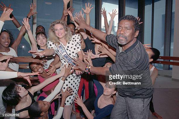 New York: Angela Visser, the current Miss Universe, from Rotterdam, Holland, joins dancers as they receive instructions from Alvin Ailey , Artistic...