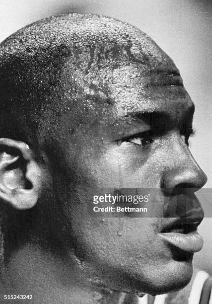 Chicago Bulls player Michael Jordan takes a break in the second quarter of the Detroit-Chicago playoff game at the Palace of Auburn Hills in...