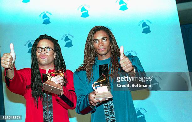 Los Angeles: Members of the group Milli Vanilli give a thumbs up as they pose for photographers at the Grammy Awards. The group was given the Grammy...