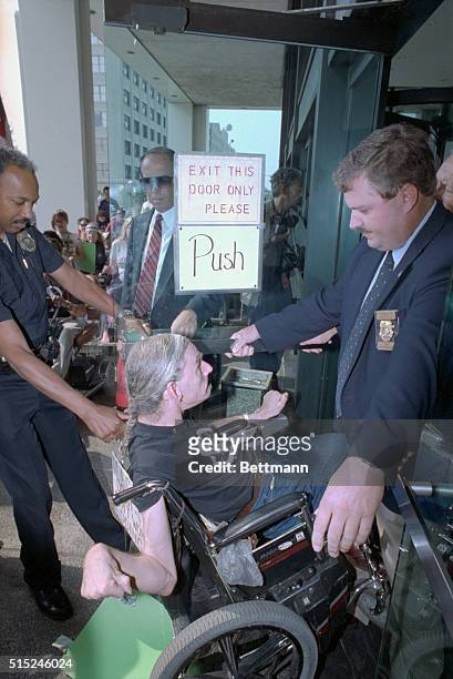 Atlanta: Disabled activist Arthur Campbell is blocked from the Richard B. Russell Federal Building by law enforcement officers after he and about 100...