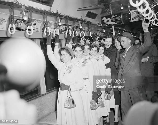 Underground Movement. New York: Thrilled by the whole idea, the Dionne quintuplets Marie, Cecile, Emilie, Annette, and Yvonne, try out one of New...