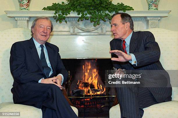 Washington: Irish Prime Minister Charles Haughey chats with President George Bush in the Oval Office.