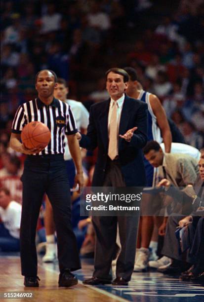 Denver: Duke coach Mike Krzyzewski pleads for some help as his big Blue Devils fall further and further behind in their NCAA Championship contest...