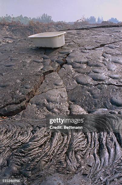 Kalapana, Hawaii: An "old-fashioned" cast iron bathtub survived the house it was in and rode a wave of lava from the Kilauea volcano in the Kalapana...