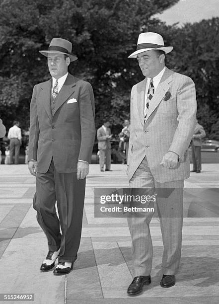 Clyde Tolson and J. Edgar Hoover is shown here arriving at the U.S. Supreme Court Building.