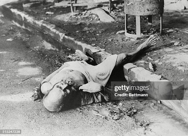 Peace at Last. Calcutta: In the famine that has spread throughout India, the toll of dead rises steadily in this photo, a body of an old man, starved...