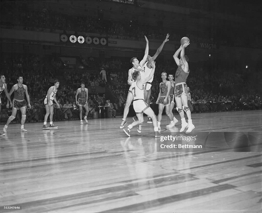 New York Knicks Players on Court with a Philly Warrior