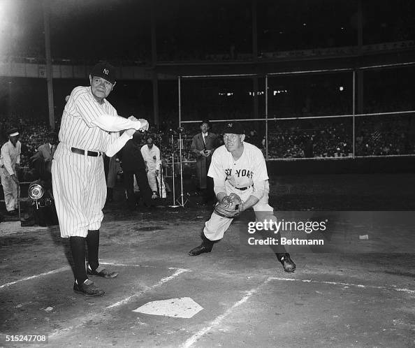 Babe Ruth Breaking Bat Babe Ruth takes a swing at bat during the 25th anniversary of Yankee ...