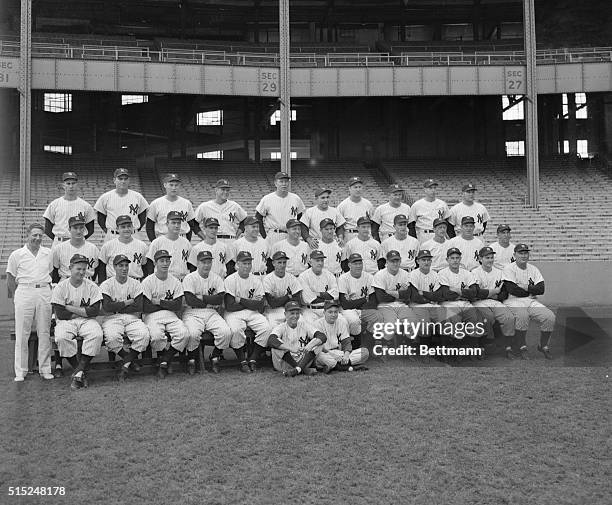 The New York Yankees team gathers for a group portrait at Yankee Stadium, September 25, 1950. In the first row, left to right, are E. Ford, P....