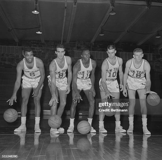 Sic 'Em Knicks. New York, New York: All set for the 1961-1962 court wars, the New York Knicks' big five roll out the ball at Fordham gym in final...