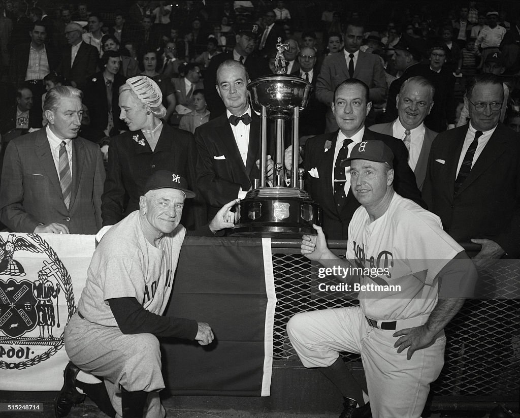Baseball Players and Trophy