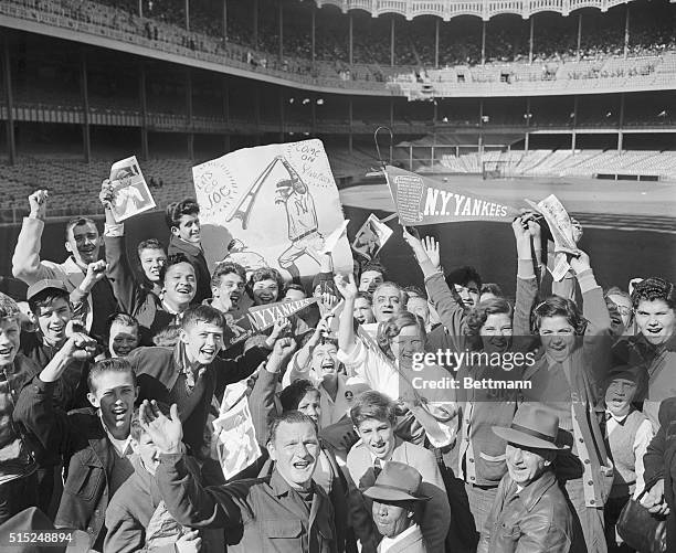 Pennant fever...These early bleacherites registered it with a bang, waving pennants like mad.