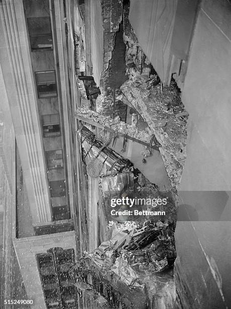 Bomber plane crashed here between the Empire State Building's 78th and 79th floors. Pieces of the plane, a jagged hole, ripped steel girders and...