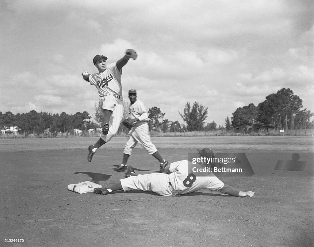 Pee Wee Reese Preparing to Throw Ball