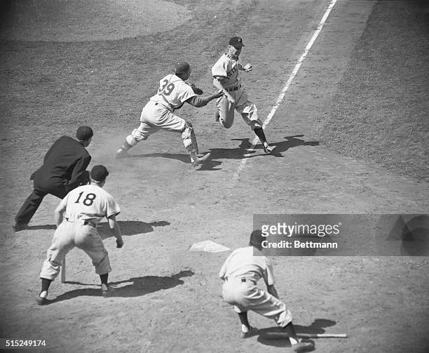 Nailed at the plate by Dodgers' Campanella is Pittsburgh's Castiglione, who tried to score from first on Metkovich's double in 7th, moments after...